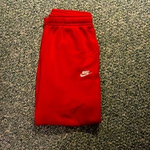 Red Nike sweatpants